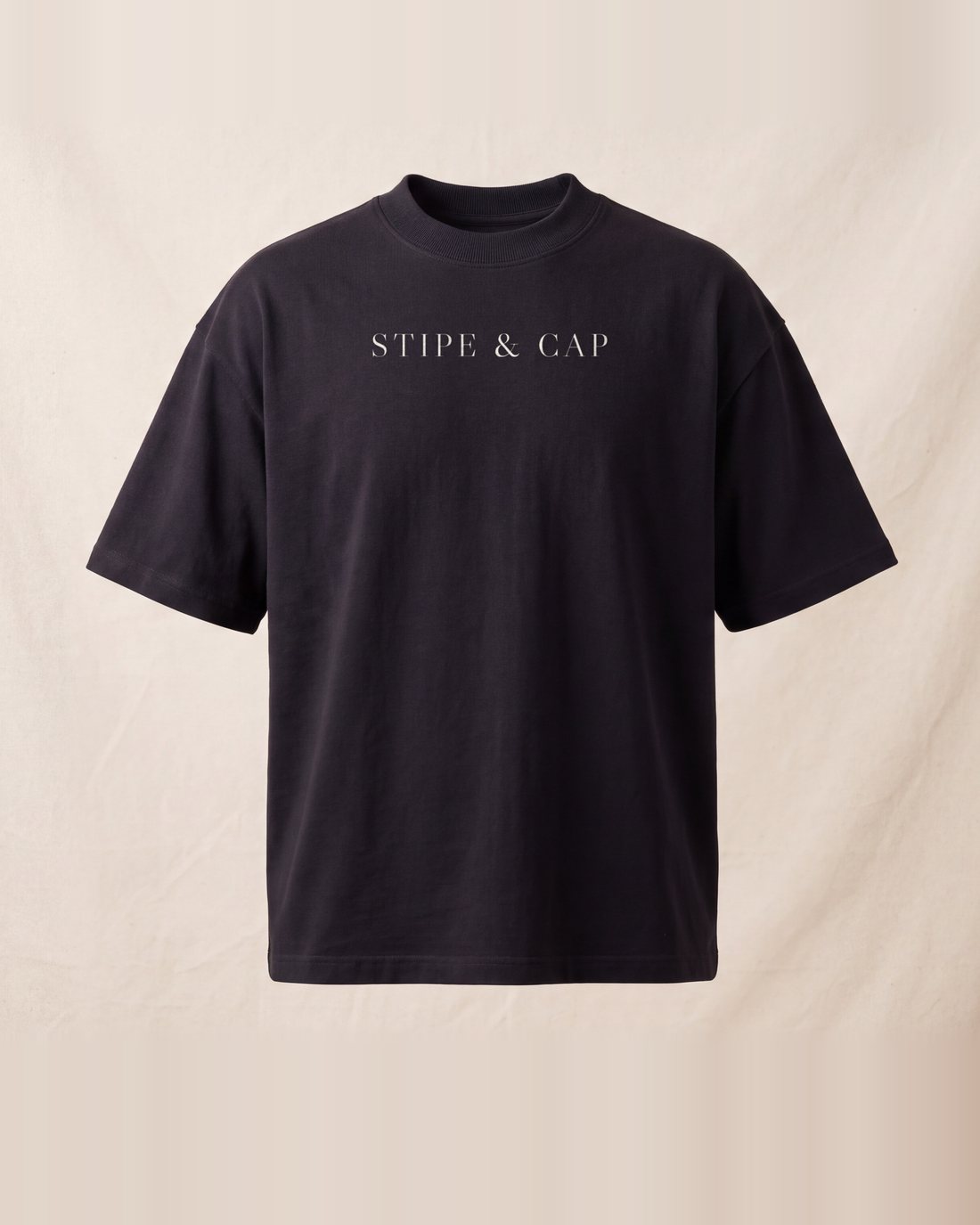The near-black tee from the back: the Cap of Gills, eleven inches across.
